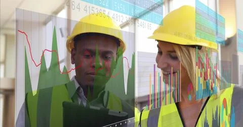 Two engineers wearing hard hats and vests examining tablet in site office, with Stock Illustration