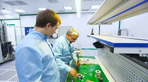 Two Engineers Were Collected and Tested Parts of the Device Tech Laboratory Video stock 60575539