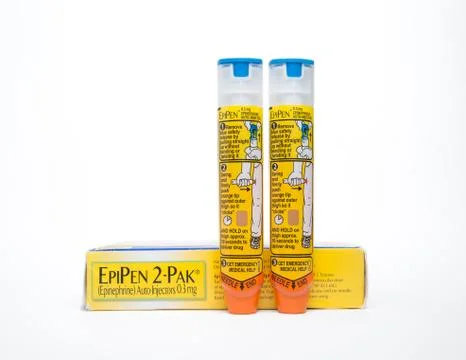 Two Epipens standing by box Stock Photos