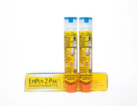 Two Epipens standing by box Stock Photos
