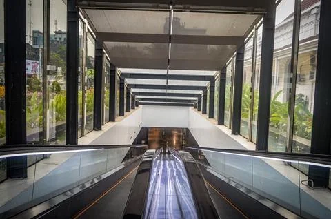 Two escalators go down to the basement of Surabaya City Square, indonesia, .. Stock Photos
