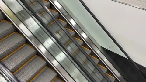 Two escalators moving in different directions Stock Footage 321182596