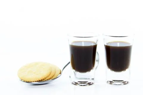 Two espresso shots with cracker Stock Photos