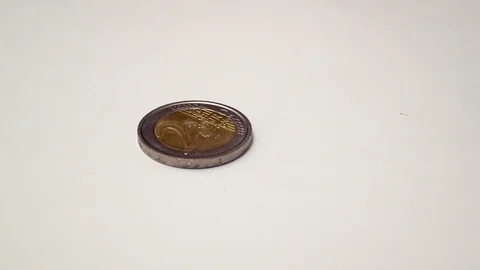 Two euro coin turns on itself until it stops Stock Footage 89269621