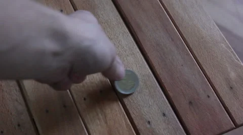 Two euro coins on table Stock Footage 55532099