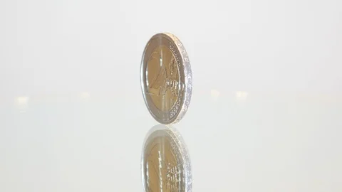 Two euros revolve on a white background Stock Footage 88337099