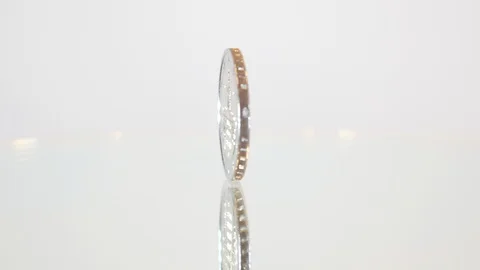 Two euros revolve on a white background1 Stock Footage 88337583