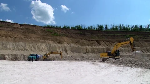 Two excavators digging the ground Stock Footage 71340451