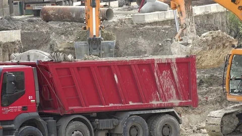Two excavators working in a new road construction, close up Stock Footage 88555490
