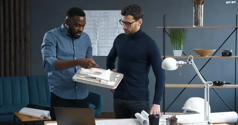 Two experienced Engineers Perfecting their Project, Making Design Corrections Видео 126162014