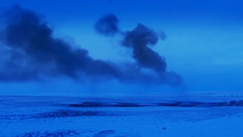 Two explosions in a snow field Stock Footage 102099423