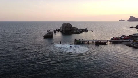 Two extremals is using flyboards on Black sea in summer day in Crimea. Stock-Footage 167448925