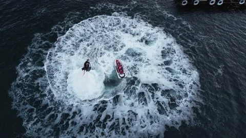 Two extremals is using flyboards on Black sea in summer day in Crimea. Stock-Footage 167448942
