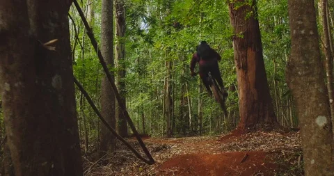 Two extreme mountain bikers shredding hard Stock Footage 119013632