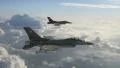 Two F-16 Fighter Jets Cruising Above the Clouds 4k or 4k+ Resolution