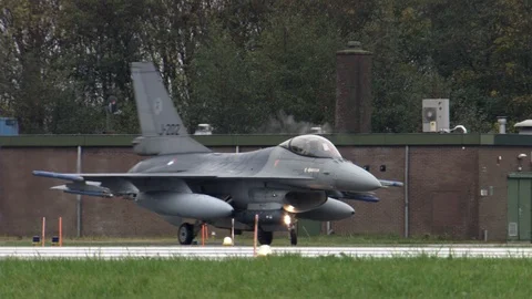 Two F16 fighter jets joining while manoeuvres on runway Stock Footage 103989649