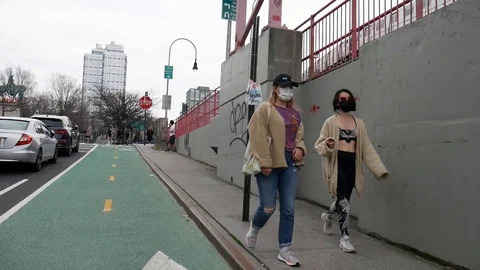 Two Face Masked Millennial Hipster Females NYC Coronavirus Pandemic Stock Footage 128008397