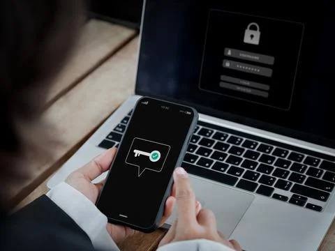 Two-factor authentication (2FA) concept. Key icon on smart phone screen in .. Foto stock
