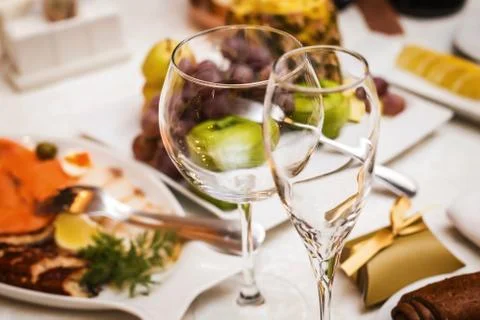 Two fancy wedding glasses on the table Stock Photos