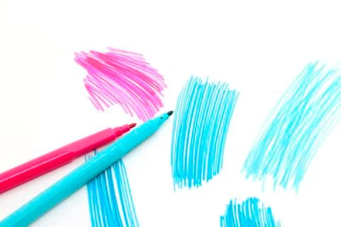 Two felt-tip pens on a white background with abstract drawings Stock Photos
