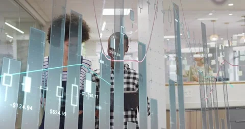 Two female colleagues opening folder, reviewing paper in office while 3D Stock Footage 329703049