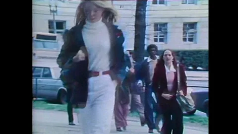 Two female college professors discuss the profound change of womens role in Stock Footage 101704353