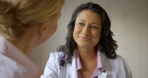 Two female doctors talking. 스톡 동영상 88376105