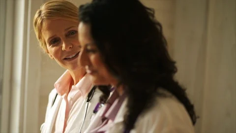 Two female doctors talking. 스톡 동영상 88405772
