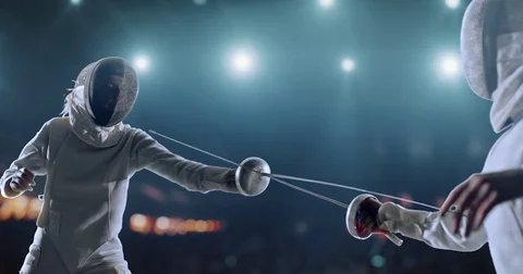 Two female fencing athletes in action Stock Footage 76361053