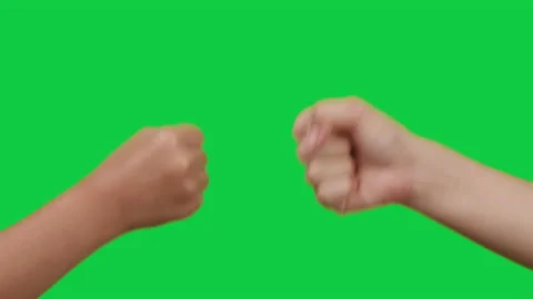 Two female hands playing rock paper scissors game on green screen background Stock Footage 174544239