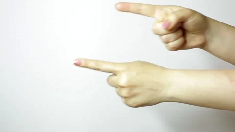 Two female hands pointing with index fingers sideways Vídeo Stock 208809944