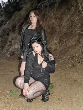 Two female models posing at night Stock Photos