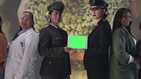 Two Female Soldiers Using Tablet with Team 動画素材 332975852