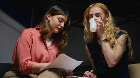 Two Female Students Discussing Script in Theater Rehearsal Stock-Footage 344520817
