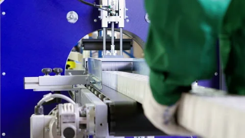 Two female workers or engineers wearing uniform working at furniture factory. 4K Stock Footage 163801647
