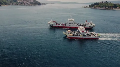 Two ferries cross in the middle of the bay Stock Footage 202212175
