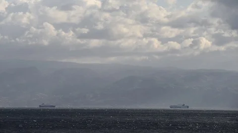 Two ferries cross the Strait of Messina Stock Footage 83886138