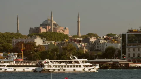 Two ferries passing each other in front of the Hagia Sophia Stock Footage 154574098