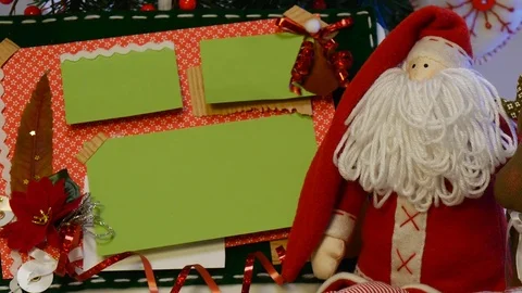 Two Festive Boxes With Photo Frames Are Taken From Under a Christmas Fir Tree Stock Footage 72548388