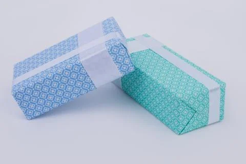 Two festive gift boxes isolated. Stock Photos