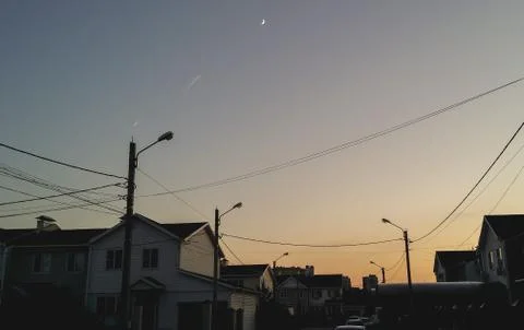 Two fighter fly on background of the moon crescent Stock Photos