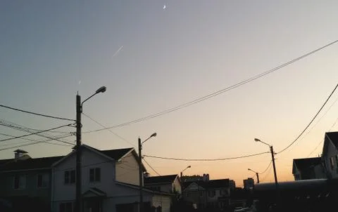Two fighter fly on background of the moon crescent Stock Photos