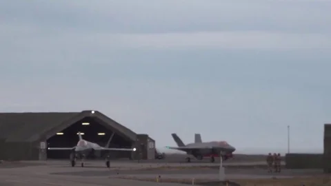 Two Fighters Move along the runway, leave the hangar Video stock 120369724