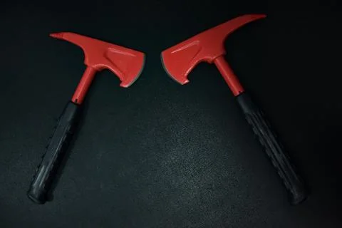 Two fire axes for the fire shield are designed for chopping and disassembling Stock Photos