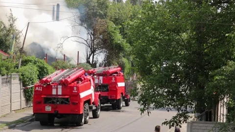 Two Fire Engines and Smoke Stock Footage 78348183