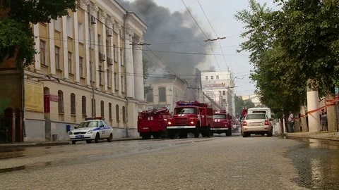Two fire engines leaving the fire Stock Footage 73253647