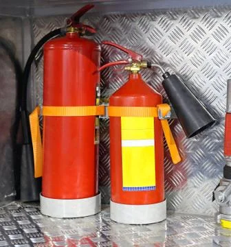 Two Fire Extinguishers Stock Photos