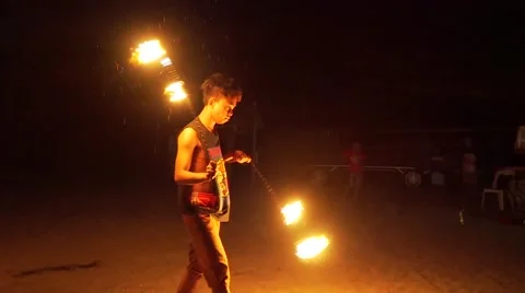 Two firedancers on beach in Philippines 動画素材 67557029
