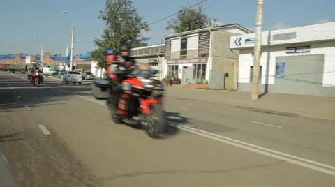 Two firefighter bikes riding at the street Stock Footage 63206959