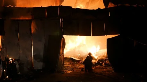 Two Fireman Extinquishing A Fire Stock Footage 91332930